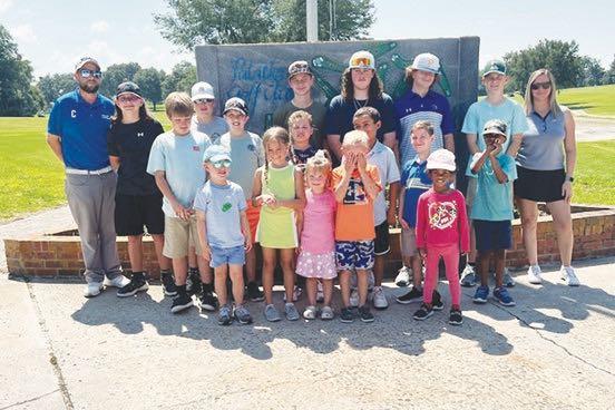 Palatka Municipal Golf Club recently held a junior golf clinic. Posing for a group shot, back row from left, are coach Joe Moseley, Robert Luke, Caleb Smith, Colton Annis, Kayden Lisle, Mason Barber, Jonah Lyons and coach Jessica Moseley. In the middle row, from left, are Caden Smith, Joshua Bradfield, Lennox Harper, David Stevens and J.J. Moseley. In the front, from left, are Lawton Kummer, Nova Wisham, Delaney Lewis, Dylan Lewis and Adaiah Sosa. Another camp takes place July 17-20 at the club.  