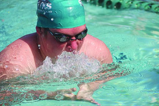 Putnam Sharks swimmer Patrick Grace churns through the water to a second-place finish in the 15-18-year-old division 50-yard breaststroke on Saturday at the Aberdeen Amenities Center in St. Johns. (COREY DAVIS / Palatka Daily News)