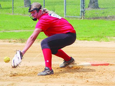 Menendez High softball player rising senior Sierra Prichard works on fielding the ball from her first base position during the North Florida Fastpitch College First Coast Future Midsummer Prospect camp Monday at Palatka Junior-Senior High softball complex. (COREY DAVIS/ Palatka Daily News)