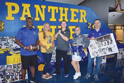 BRANDON D. OLIVER/Palatka Daily News -- Palatka Junior-Senior High School Principal Cathy Oyster, center, stands with her assistant principals, from left, Lamar Purifoy, Joy Eubanks, Cindy Bellamy and Michael Chaires on Friday as they show their Panther spirit before school begins Aug. 10.