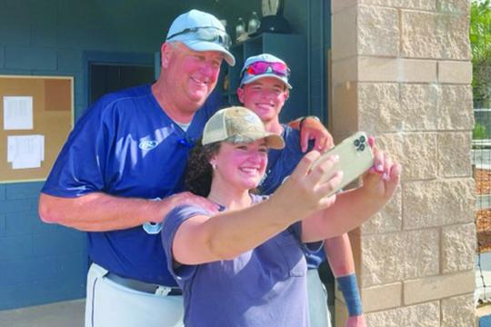 Jack Slater (above, right) poses for a selfie with his sister, Julia, and St. Johns River State College coach Ross Jones after the Vikings clinched a berth to the NJCAA Division II World Series on May 13. (MARK BLUMENTHAL / Palatka Daily News)