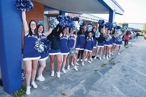BRANDON D. OLIVER/Palatka Daily News -- Interlachen Junior-Senior High School cheerleaders show their school spirit at the drop-off line to welcome their classmates to school Thursday.