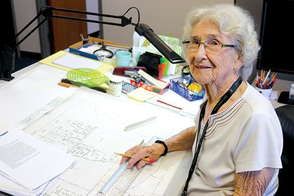 TRISHA MURPHY/Palatka Daily News -- Palatka resident Pat Bennett sits at her desk, where she has worked as a mapper for the Putnam County Property Appraiser’s Office for 42 years and counting.