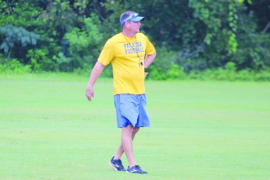 Palatka head coach Patrick Turner watches a play develop during his first day of practice for the 2023 season. (MARK BLUMENTHAL / Palatka Daily News)