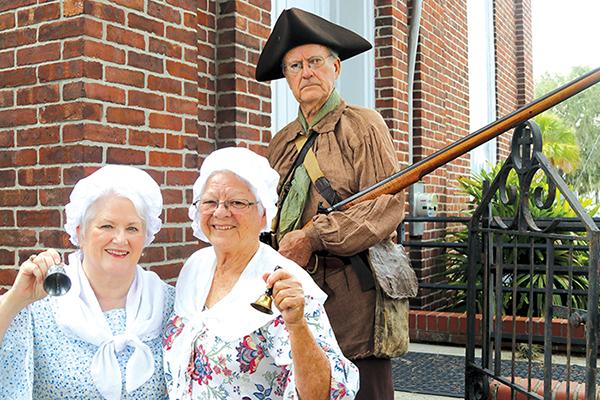 TRISHA MURPHY/Palatka Daily News – Meri Rees, left, Suzanne Wolding, center, and Lyle Wolding are dressed up in anticipation of Constitution Day on Saturday.