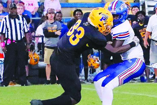 Palatka’s Elysha Campbell II takes down Keystone Heights running back Cartez Daniels during the Panthers’ 41-21 victory. (RITA FULLERTON / Special to the Daily News)