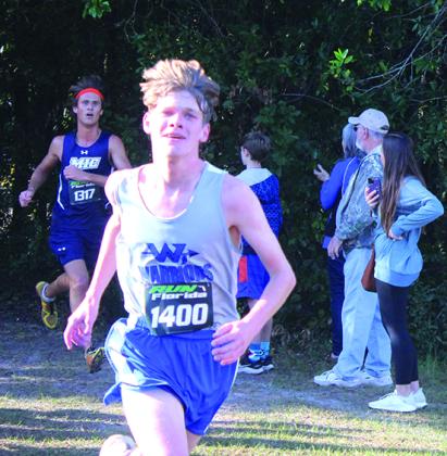 Peniel Baptist Academy's Reed Rion heads to the finish line Thursday at the Region 2-1A championship at Alligator Lake Park, Lake City, finishing 53rd in 19:01. (MARK BLUMENTHAL / Palatka Daily News)