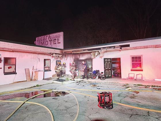 Photo courtesy of Putnam County Fire Rescue Local 3529 – Firefighters ensure they extinguished a structure fire at Siesta Motel in East Palatka on Tuesday evening.