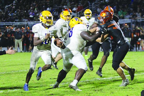 Palatka quarterback Tommy Offord looks for yardage against Tocoi Creek on Sept. 29. (MARK BLUMENTHAL / Palatka Daily News)