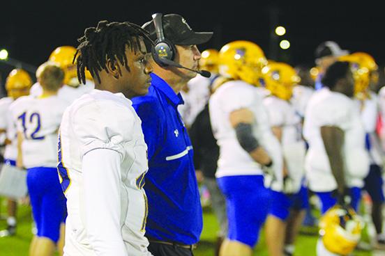 Palatka quarterback Tommy Offord (left) and coach Patrick Turner go into the postseason after losses to tough Bradford and St. Augustine. (MARK BLUMENTHAL / Palatka Daily News)