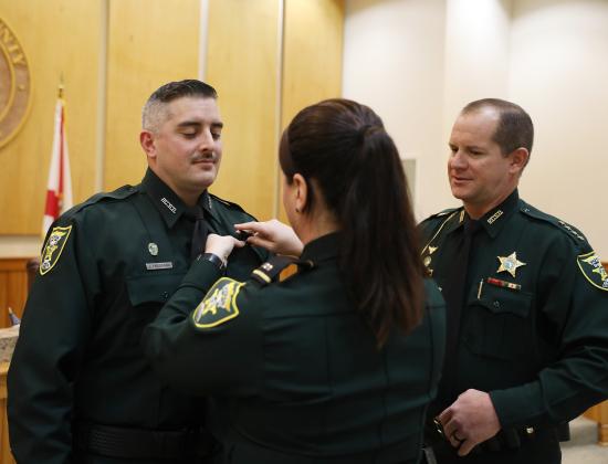 Courtesy of the Putnam County Sheriff's Office. Putnam County Sheriff's Office corrections deputy James Freeman is sworn into office on Sept. 20, with former Lt. Karly Yoder pinning him during the ceremony. 