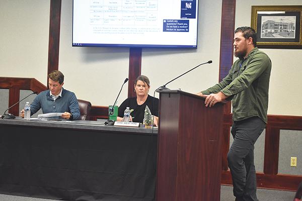 BRANDON D. OLIVER/Palatka Daily News – Interim Palatka City Manager Jonathan Griffith, left, and City Attorney Jane West, center, listen as Public Works Director Del McMillan talks about the complications found during an ongoing sewer repair project.