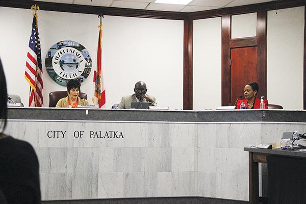 SARAH CAVACINI/Palatka Daily News – Palatka Mayor Robbi Correa, left, talks about the contract to repair the Jenkins Community Center on Thursday while Commissioners Rufus Borom, center, and Tammie McCaskill listen.
