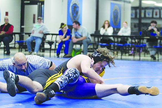 Palatka’s Blake Young tries to put Union County’s Jarred Bennett in pin position during their 138-pound match Tuesday night at Palatka. Young won by pin in 43 seconds. (MARK BLUMENTHAL / Palatka Daily News)