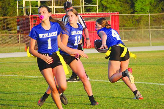 Seen in a game last year, Paislee Guessford (1) and Camryn Link (11) had a hand in the two touchdowns that lifted Interlachen to a 13-0 win Thursday over Jacksonville Global Outreach. (COREY DAVIS / Palatka Daily News)