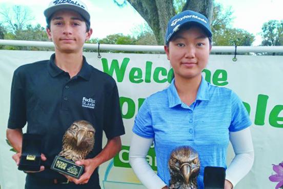 Elite Boys and Girls division champions Jaspreet Kondal (left) and Katie Yang pose with their awards. (DANNY HOOD / Daily News correspondent)