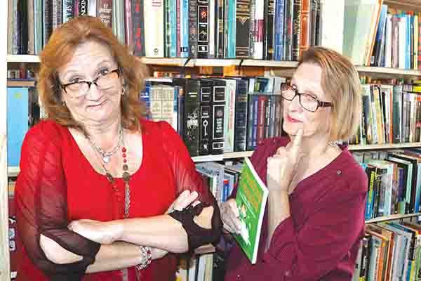 TRISHA MURPHY/Palatka Daily News – Longtime friends Rhonda Odom, left, and Sharon E. Buck showed the humorous side of the book they wrote called “A CPA’s Guide to Hilarious Client Encounters – A Lighthearted Look at the World of Finance.”