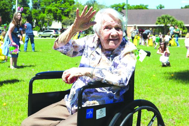 TRISHA MURPHY/Palatka Daily News. Edith Poulin celebrated her 104th birthday a day early on Friday at Radiant Nursing and Rehab Center in Palatka during the center’s Spring Fling Community Event, which included Easter egg hunting for kids and a birthday cake served to guests.
