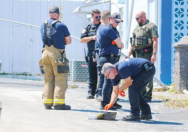 SARAH CAVACINI/Palatka Daily News – Emergency officials from numerous local agencies work the scene near the intersection of St. Johns and Moseley avenues in Palatka, where a Putnam County Sheriff’s Office deputy was exposed to an unknown white, powdery substance Friday.