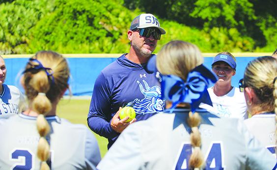 St. Johns River State College coach Joe Pound congratulates his team for winning the Sun-Lakes Conference regular-season championship after a 10-6 win over Lake-Sumter State College Saturday. (MARK BLUMENTHAL / Palatka Daily News)