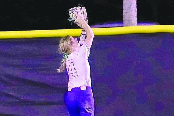 Palatka’s Molly Allbritton makes a running catch in center field on a fifth-inning flyball hit by Allie Peacock. (RITA FULLERTON / Special to the Daily News)