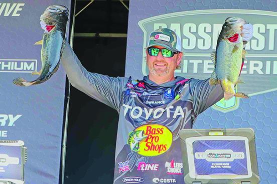 Shelby, North Carolina’s Matt Arey holds up two of his catches Friday. Arey is in second place behind Corey Johnston. (RITA FULLERTON / Special to the Daily News)