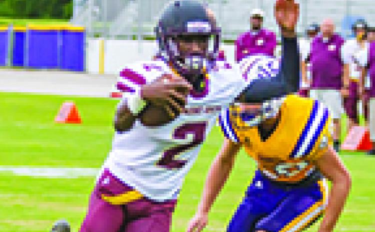 Pictured in the Aug. 16 preseason game at Union County, Crescent City senior quarterback Naykee Scott passed for five touchdowns two weeks ago. (FRAN RUCHALSKI / Palatka Daily News)