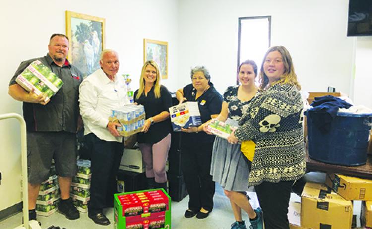 Beck Automotive Group donates food that was distributed throughout the county.