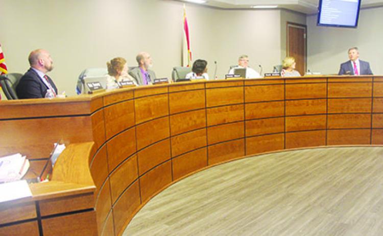 The school board discusses the Guardian Program.