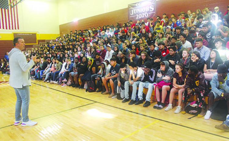 Chris Herren speaks to students at Crescent City High School.