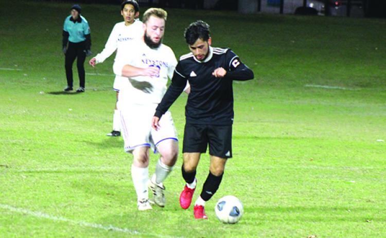 Crescent City’s Fernando Jimenez Cruz is in front of Keystone Heights’ Landon Ricketts in the first half of last Friday’s District 4-3A final. (MARK BLUMENTHAL / Palatka Daily News)