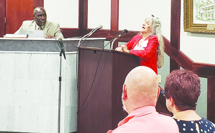 Kate McDaniel expresses frustration when speaking to the Palatka City Commission on Thursday about the possibility of the Palatka Art League losing the Tilghman House as a base of operations.