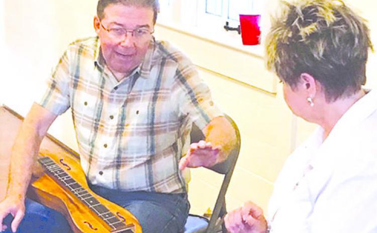 Larry and Elaine Conger of Putnam County recently conducted a dulcimer workshop like they will do today at the Genealogy & History Expo that will take place at the Bronson-Mulholland House, 100 Madison St. in Palatka.