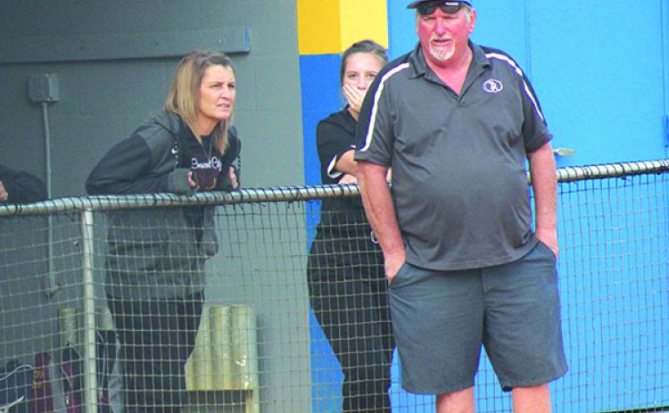Head softball coaches Karen Baker of Crescent City, left, and Ron Whitehurst of Interlachen chat with one another during the All-Putnam County Tournament last Friday at Palatka High School. (MARK BLUMENTHAL / Palatka Daily News)