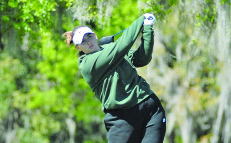 Lisa Colee of DeLand hits her drive off the No. 2 tee at Palatka Municipal Golf Course in the Junior Azalea Golf Tournament. The Senior Azalea is this weekend. (GREG WALKER / Special To The Daily News)
