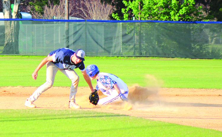 Interlachen’s Kody Shrouder steals second ahead of the throw to P.K. Yonge shortstop Kyle Chappell. (ANDY HALL / Palatka Daily News)