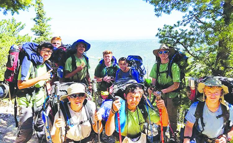 Residents from Rodeheaver Boys Ranch, which is celebrating its 70th anniversary this year, backpack through mountains.
