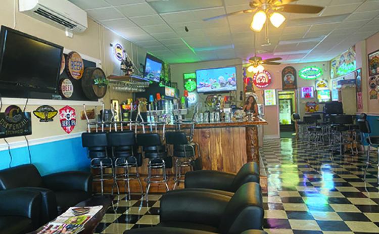 David Griffin, owner of Uncork & Unwind Craft Beer and Wine Lounge in Palatka, says he is excited to open his lounge as Phase 2 begins in Florida on Friday.