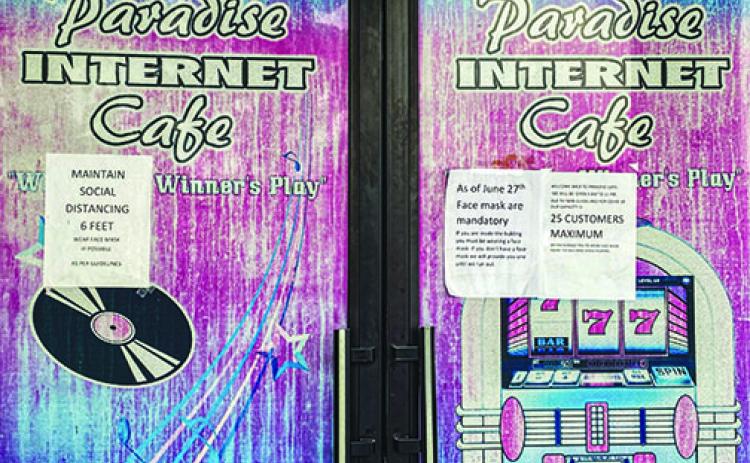 Paradise Internet Cafe in East Palatka mandates face masks and social distancing for customers to enter the business.