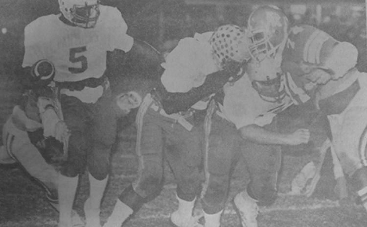 Daily News file photo Clifton Reynolds follows his blockers to score a touchdown in the FHSAA 3A state championship game against Titusville in 1983. (Daily News file photo)