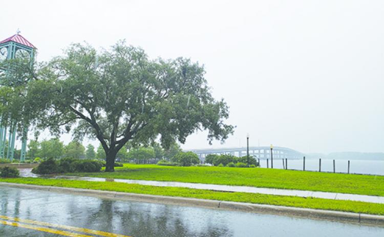 Rain lashes the Palatka riverfront earlier this summer.
