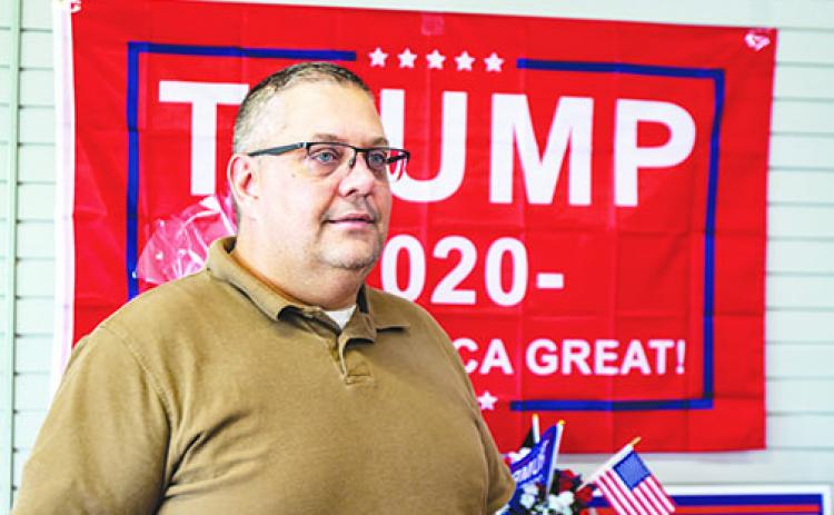 Paul Adamczyk keeps busy at the Republican Party headquarters in Palatka on Monday after winning the District 5 county commission seat last week.