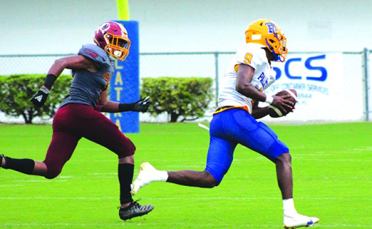 Palatka High School quarterback Omarrion Wilson takes off with the ball on a first-quarter run of 27 yards during last Friday night’s opener against West Nassau High. (ANDY HALL / Palatka Daily News)