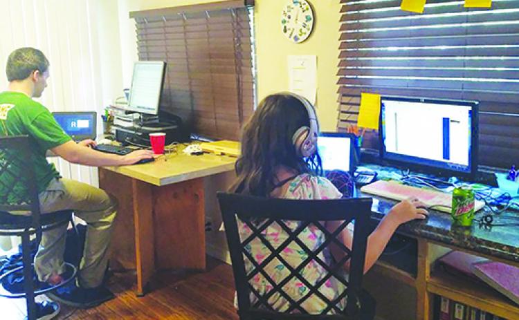 Putnam County School District students attend class last month via distance learning.