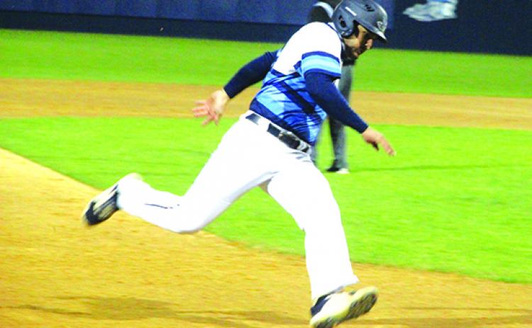 St. Johns River State’s Daniel Labrador rounds third base and heads home with a fourth-inning run against Lake-Sumter on Monday night. (ANTHONY RICHARDS / Palatka Daily News)