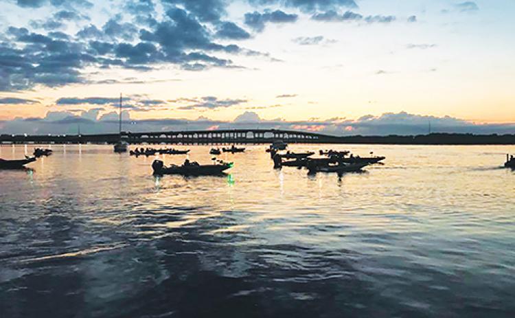 Anglers prepare for takeoff on the St. Johns River during a previous Wolfson Children’s Hospital Bass Tournament with the Memorial Bridge in the background.