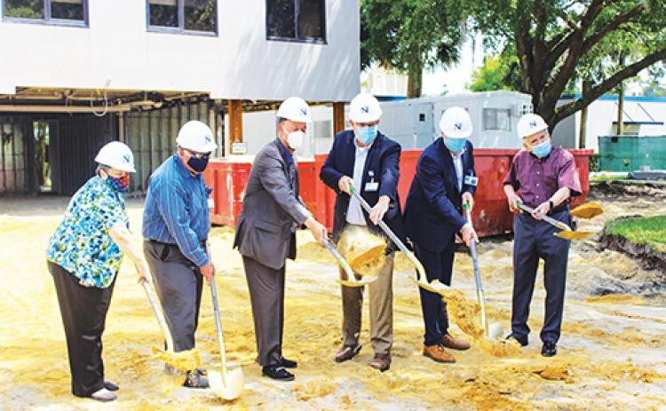 Putnam Community Medical Center board members break ground Thursday on the site of the hospital’s new MRI unit that officials expect to be completed by the end of the year.