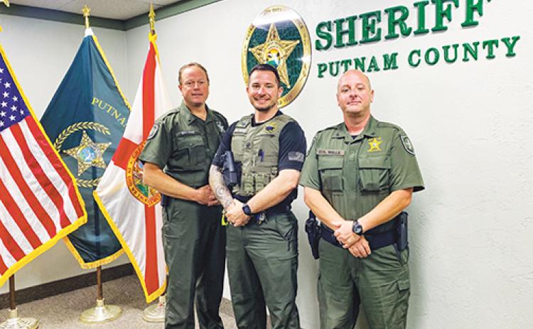 From left, Putnam County Sheriff’s Office Maj. Steve Rose, Maj. Scott Surrency and Col. Joe Wells stand in the sheriff’s office after explaining the resources they have to help people struggling with substance use.