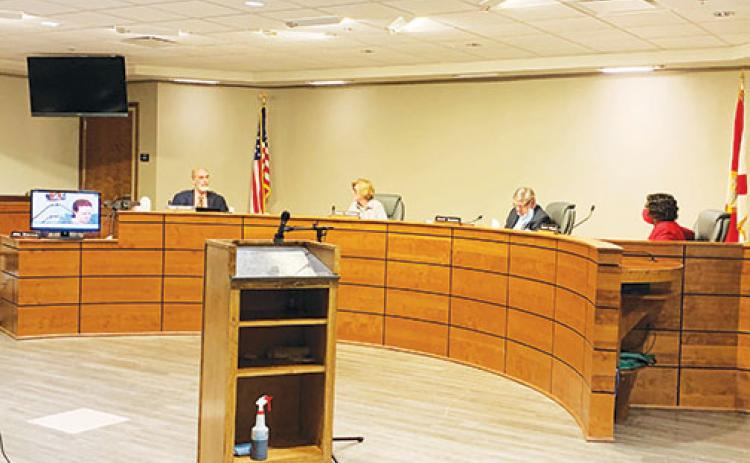 The Putnam County School District board discusses the matters at hand during a meeting in March.