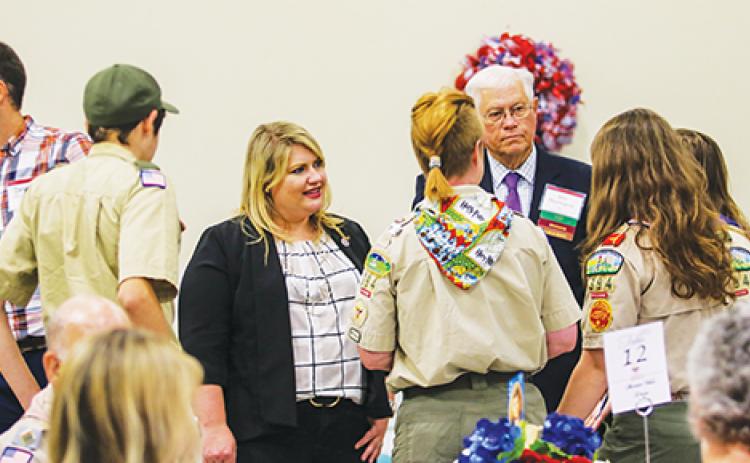 U.S. Rep. Kat Cammack speaks with Scouts and Honoree Bill Herrington at the Palatka American Values Dinner on Thursday.